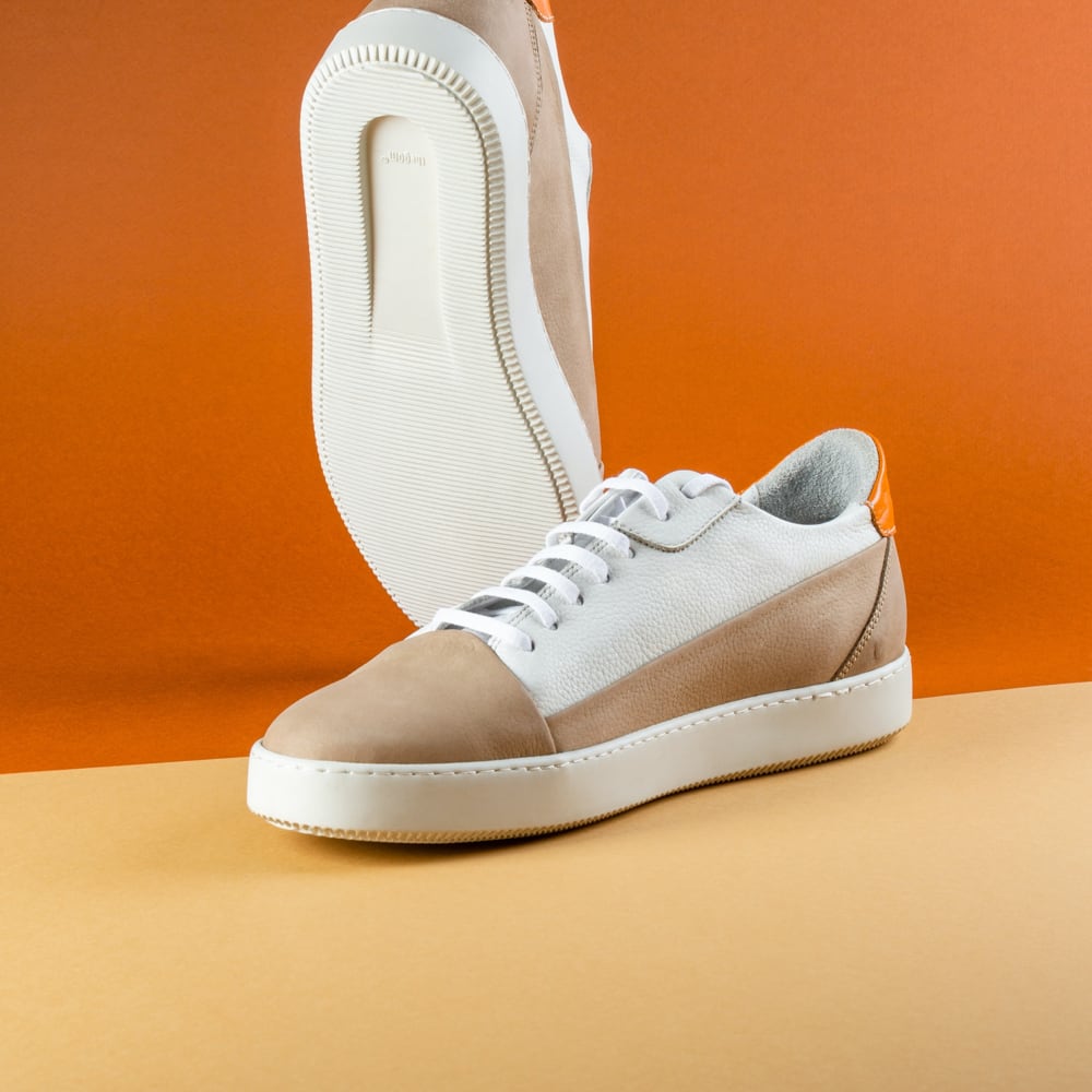 Brown and white sneaker